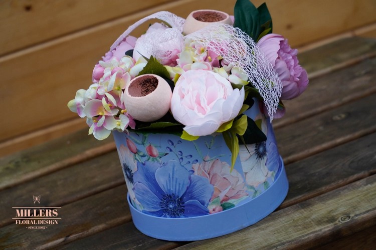 Pink artificial hatbox